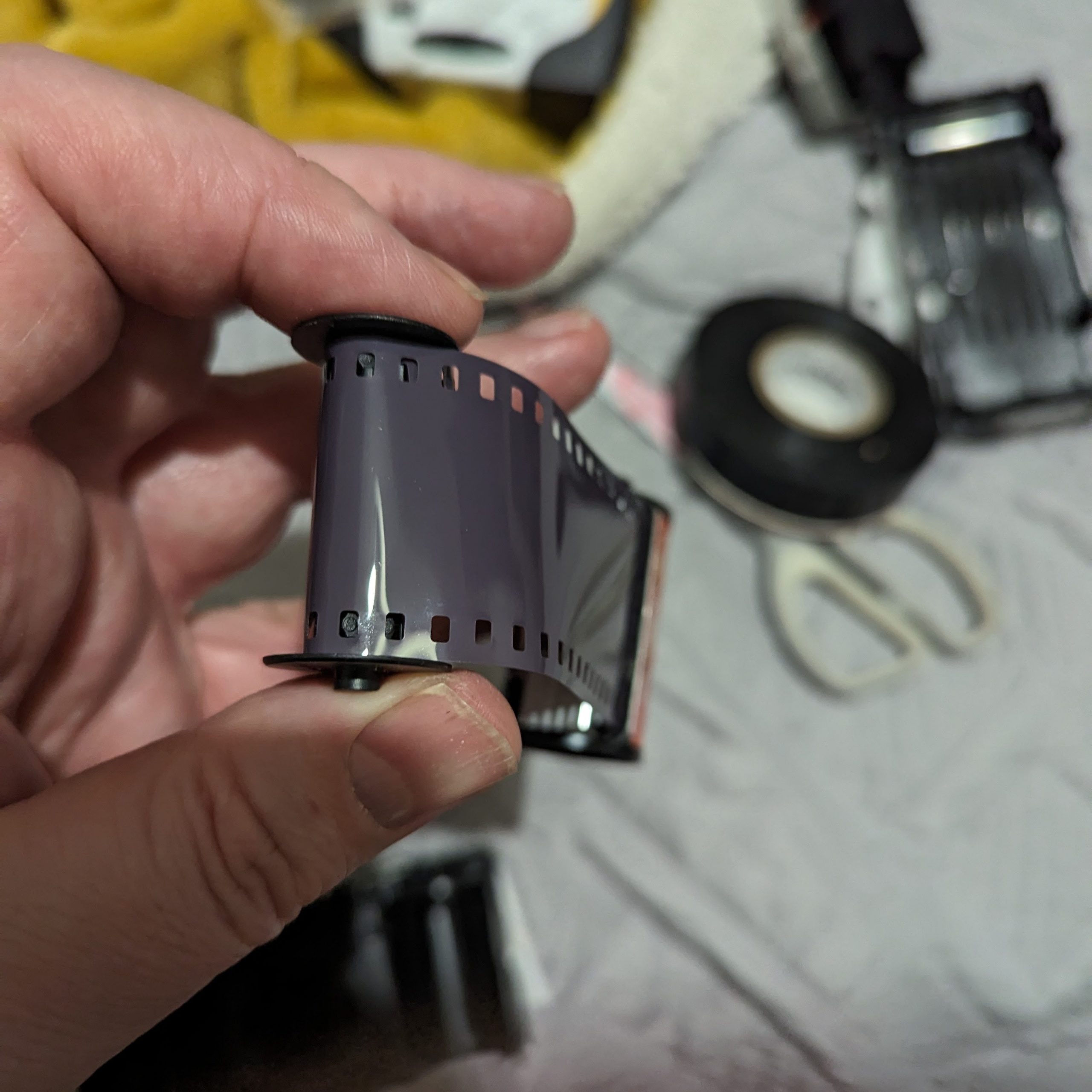 Reloading film spool of an Ilford Ilfocolor Rapid Half frame.