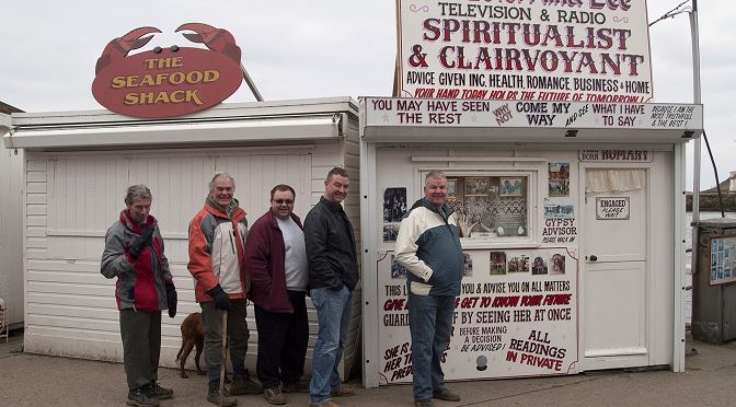 They really were queueing to see the clairvoyant. "We need to know if we'll make it through the weekend." said one.